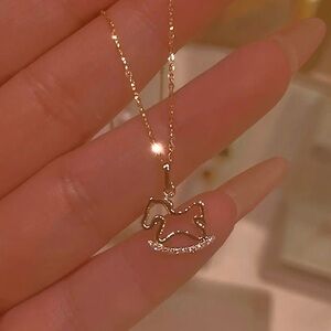 Charming Gold Rocking Horse Necklace